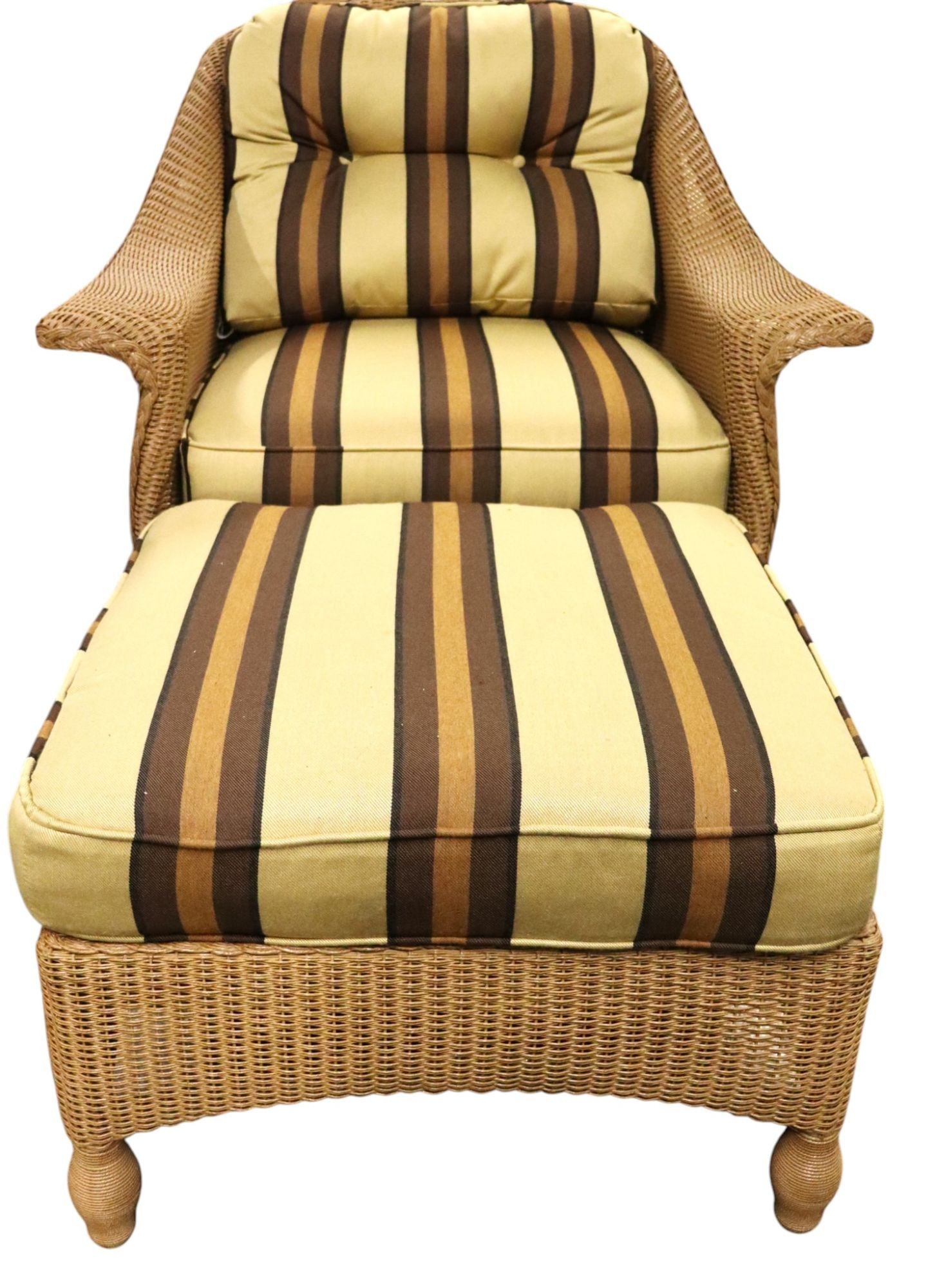 Lloyd Flanders Wicker Armchair and Ottoman Set wi: This is a charming wicker armchair and matching ottoman set, designed to provide comfort and style. The set features a tightly woven wicker frame in a natural finish, characteristic of classic