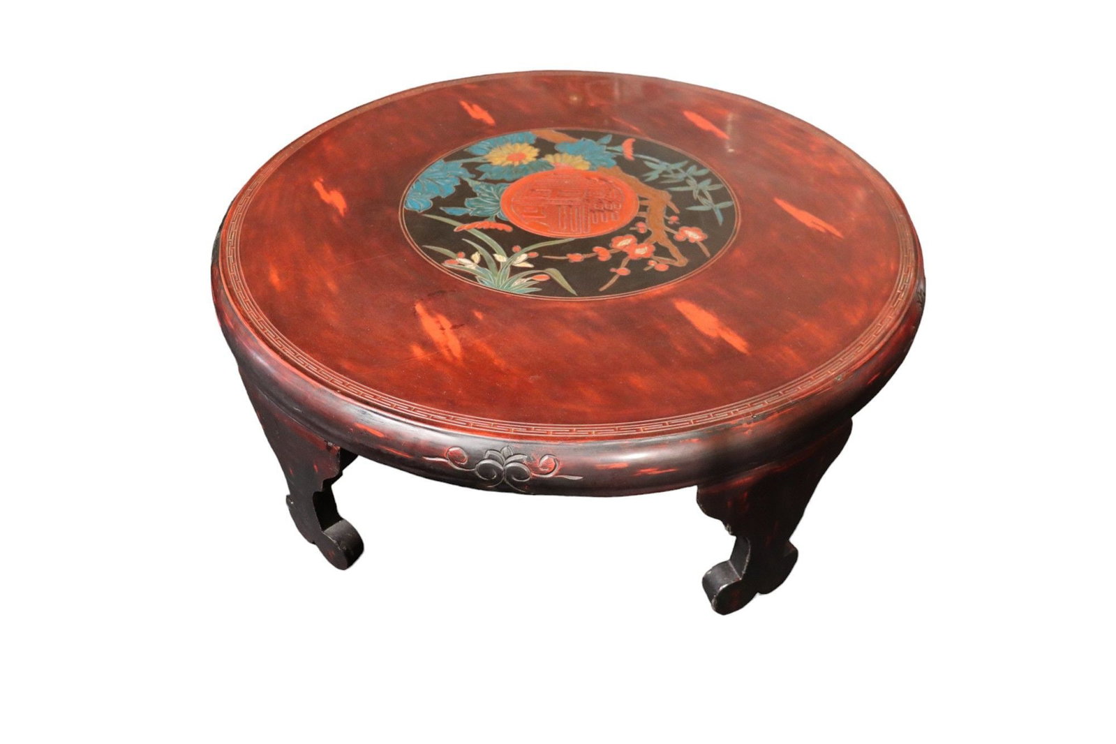 Chabudai Japanese Round Table with Carved & Paint: This exquisite Chabudai Japanese round table features a richly colored finish and intricate decorative elements. The tabletop is adorned with a central medallion showcasing a carved and painted floral