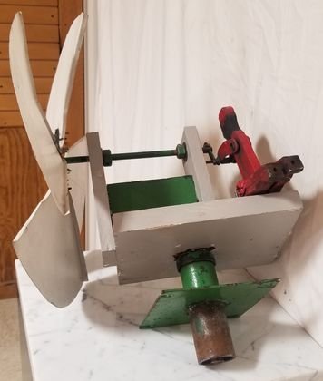 C. 1940\: Circa 1940s whirligig with metal blades and figure of Bellboy 16 and 1/2 inch blades original paint.