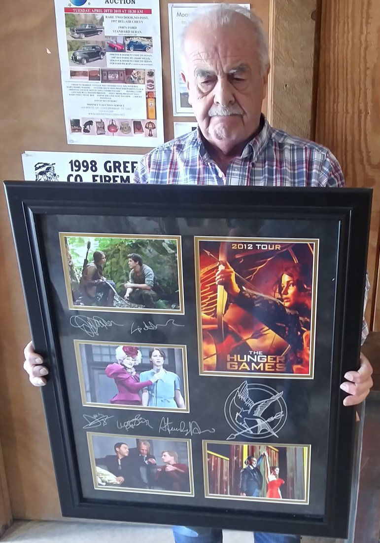 HUNGER GAMES Framed Autographed collage: HUNGER games collage framed and autographed