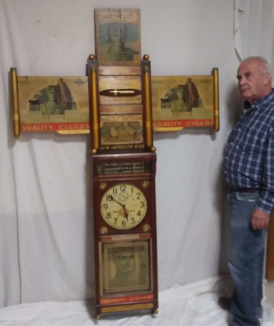 W H Haines Cigar Company Clock: This is a novelty clock that is in running condition with the original pendulum. There are many old labels on this clock including old Rome cigars, Remus, Blue Ribbon Etc. This is a great piece with l