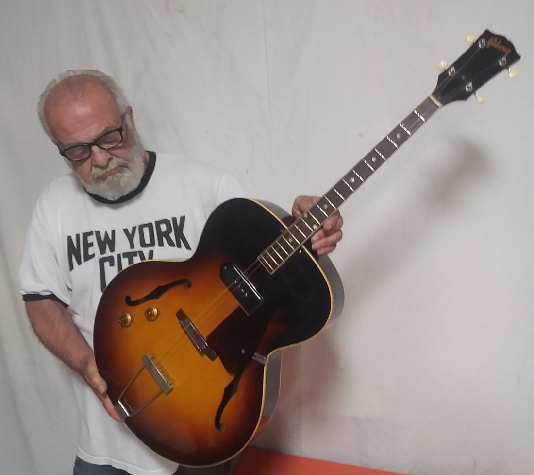 Gibson Starburst Acoustic Electric Guitar: 4 string, in original case. Measures 38 1/2\" long 16\" wide 3 1/2\" deep