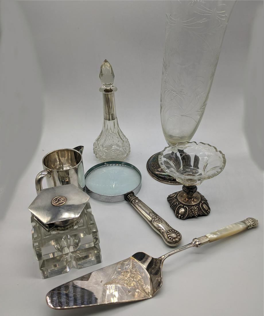 A collection of silver items to include a milk jug, (1 of 2)