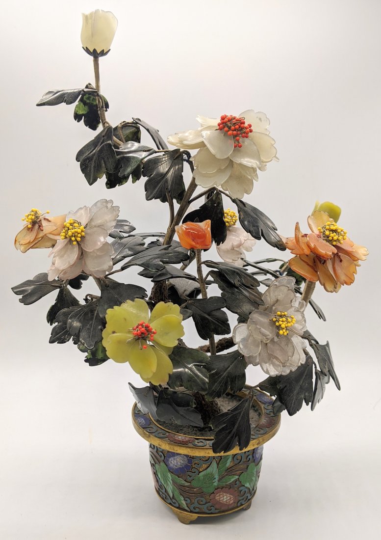 A Chinese jadeite and coral plant with cloisonne enamel: A Chinese jadeite and coral plant with cloisonne enamel pot, H.29cm