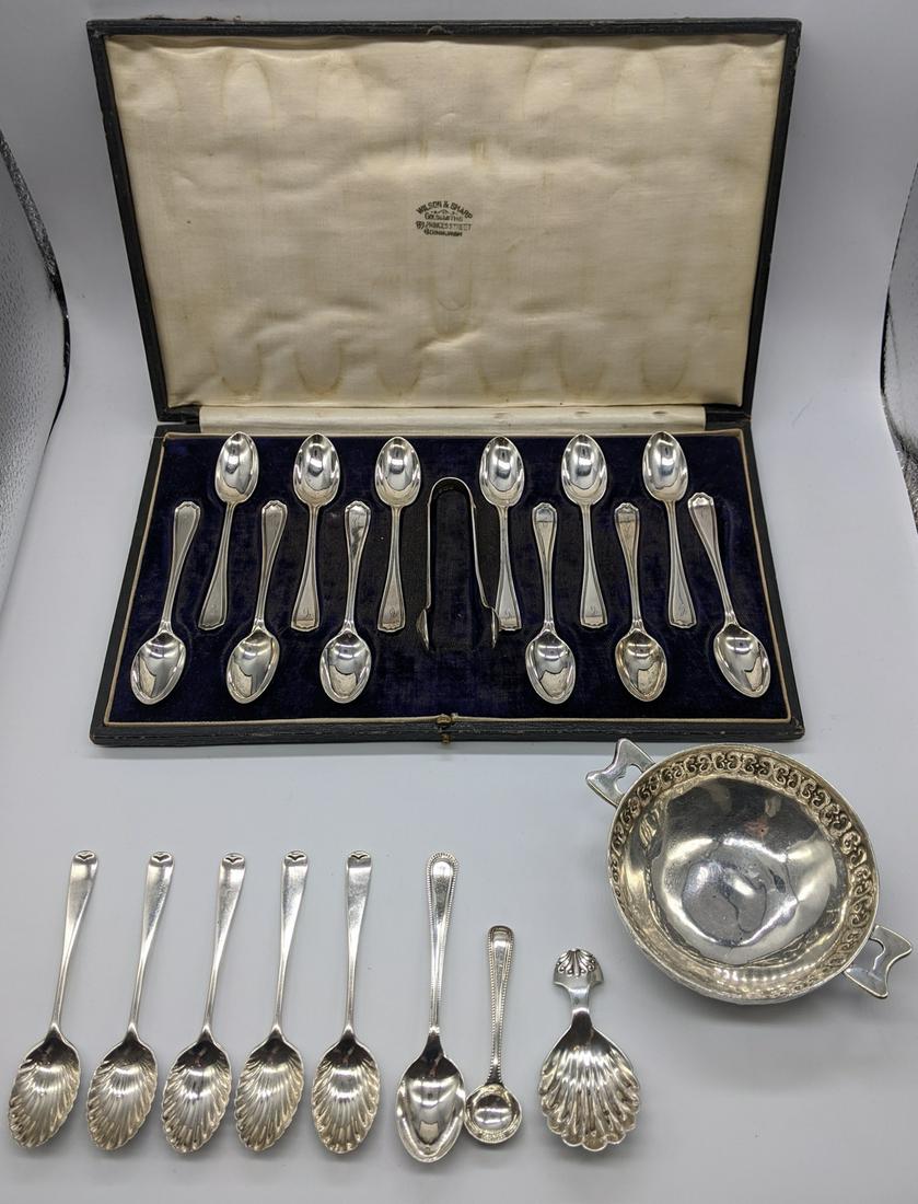 A collection of silver to include a cased set of 12: A collection of silver to include a cased set of 12 spoons (tongs not original), 6 teaspoons, a mustard spoon, a caddy spoon and a South American quaich W.12cm