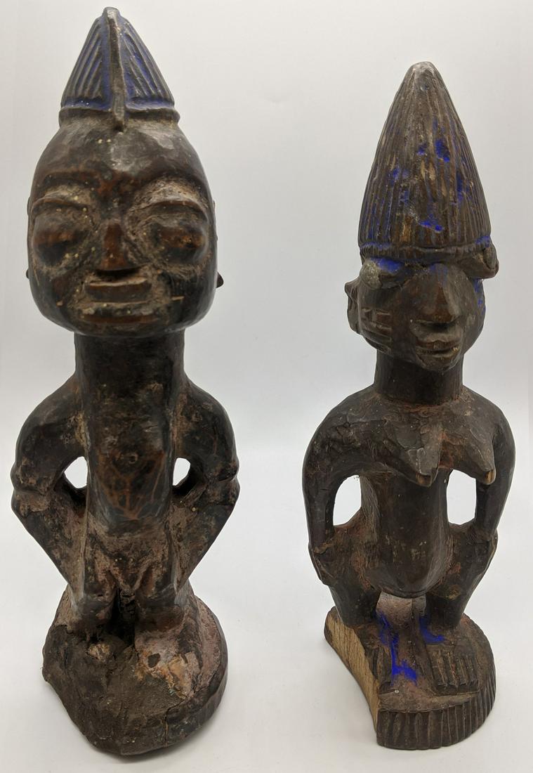 Two 19th century Nigerian tribal wooden figural: Two 19th century Nigerian tribal wooden figural carvings, Yoruba Ibeji, H.24cm