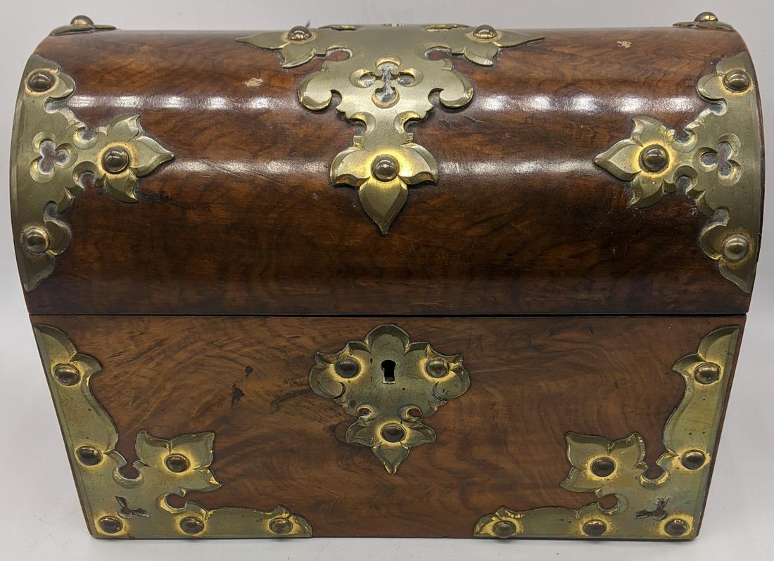 A Gothic Revival chest, with internal tea caddies,: A Gothic Revival chest, with internal tea caddies, walnut veneer, applied brass appliques, H.17cm D.12.5cm W.23cm