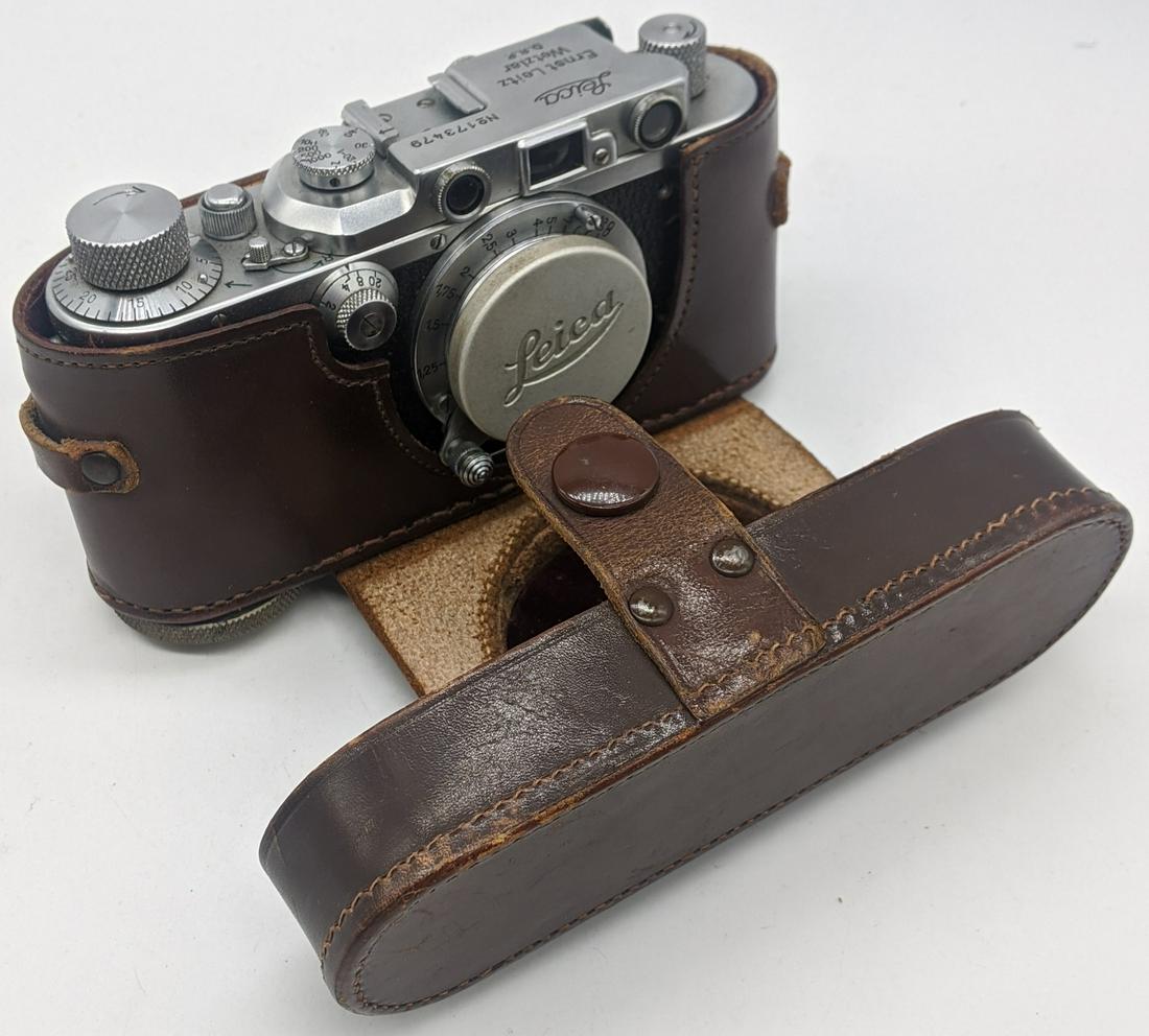 A cased Leica Ernst Leitz Wetzlar D.R.P. No.173479,: A cased Leica Ernst Leitz Wetzlar D.R.P. No.173479, IIIa, 1935, with a Leitz Elmar f=5cm 1:3,5 lens