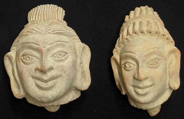 Two carved red sandstone terracotta heads of Hindu (1 of 2)