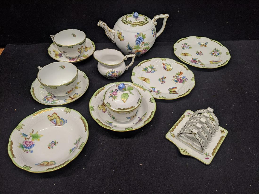A Herend of Hungary porcelain breakfast service to: A Herend of Hungary porcelain breakfast service to include a teapot, sugar pot, toast rack, 2 bowls, 2 plates, 2 cups and saucers and a milk jug