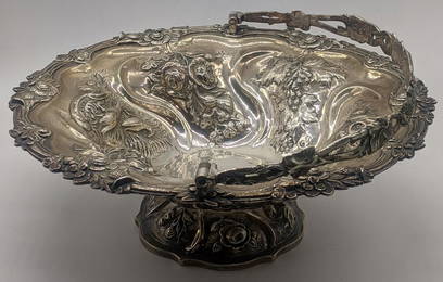 A large Victorian silver bowl, embossed with splays of