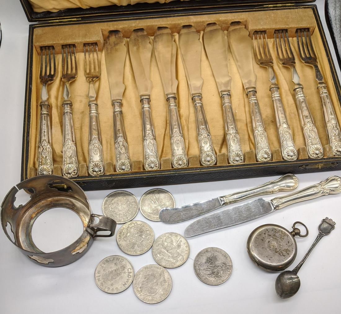 A set of silver handled, knives and forks, hallmarked: A set of silver handled, knives and forks, hallmarked Sheffield, together with other silver tableware and coins
