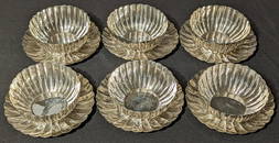 A Japanese silver chrysanthemum tea set by Asahi (Asahi