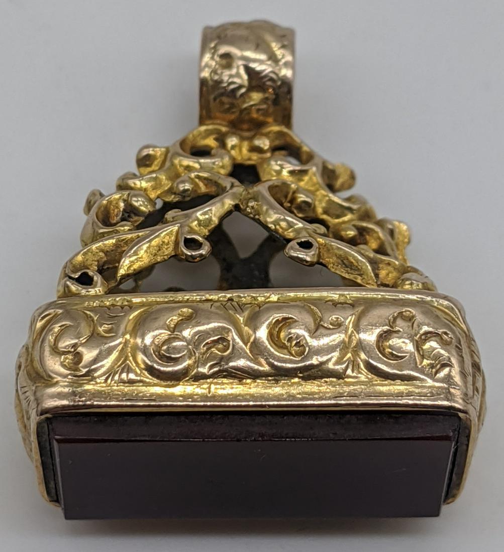 A 9ct gold seal fob, vacant carnelian, 8g, H.2.5cm: A 9ct gold seal fob, vacant carnelian, 8g, H.2.5cm