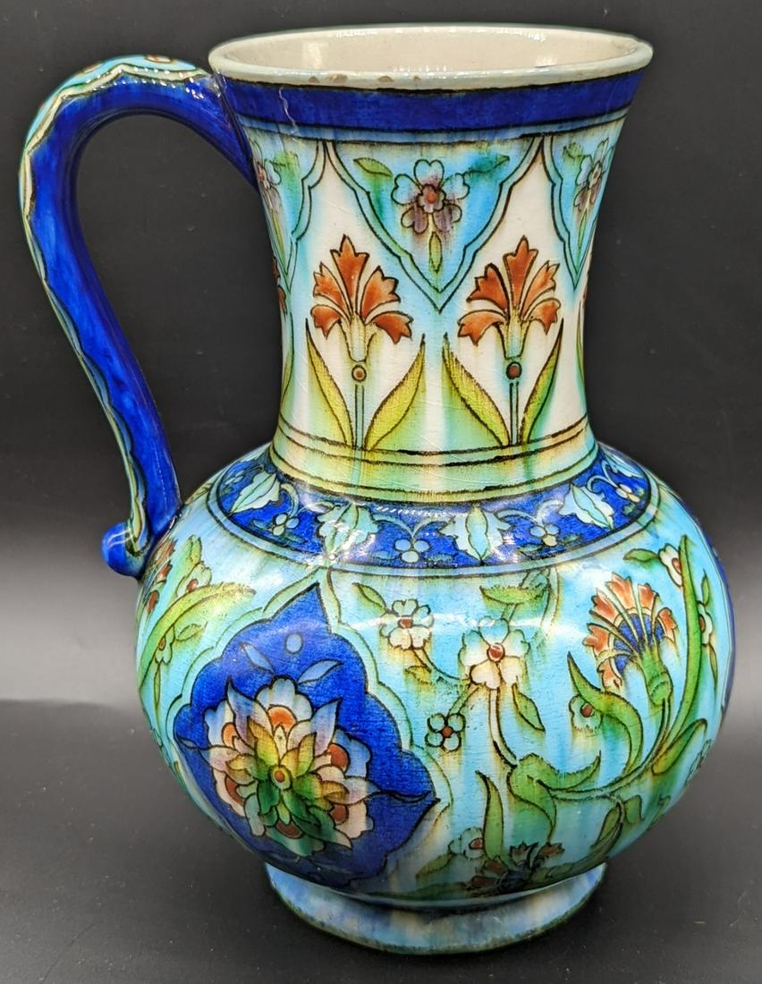 A late 19th century French Theodore deck jug in the Iznik style, H.19cm: A late 19th century French Theodore deck jug in the Iznik style, H.19cm