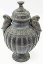 A fine 19th century Indian lidded brass vase with parrots finials, H.17cm