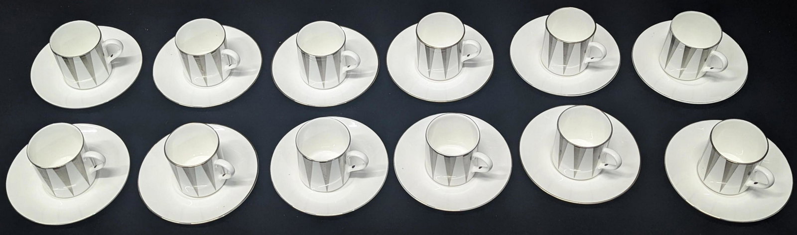 An Asprey of London coffee set, 12 cups and saucers: An Asprey of London coffee set, 12 cups and saucers