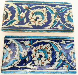 A pair of 16th century Turkish Ottoman Iznik border tiles, 25.5cm x 13cm