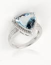 An aquamarine ring, 5.98 trillion cut mounted on 18ct white gold with small VS diamonds, 5g