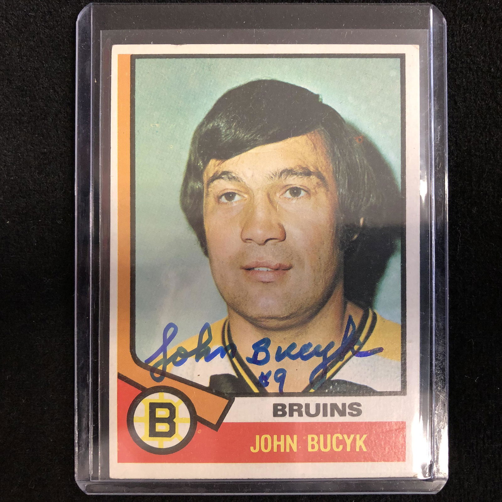 JOHNNY BUCYK SIGNED VINTAGE HOCKEY CARD (1 of 1)