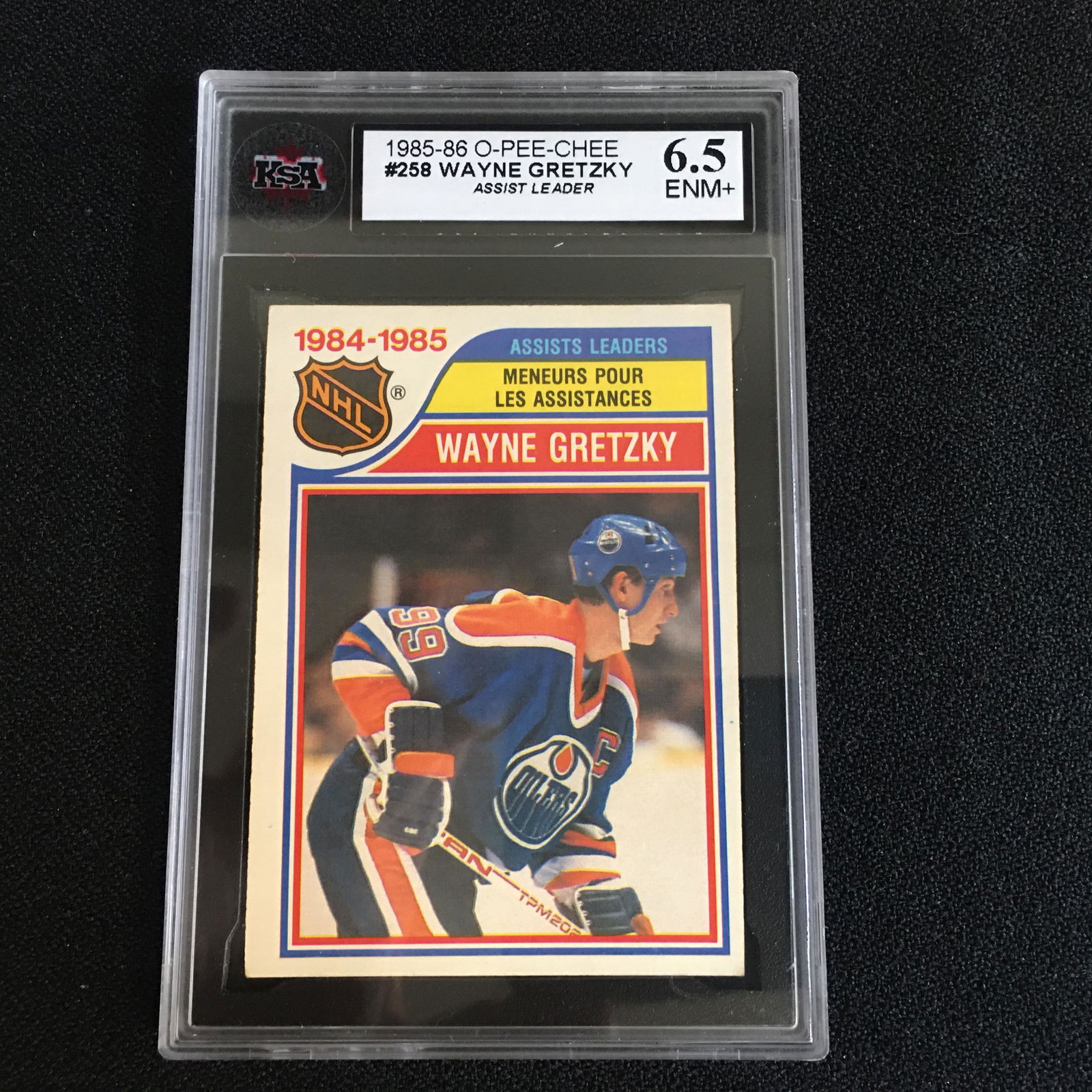1985-86 OPC N0.258 WAYNE GRETZKY ASSIST LEADER (6.5 ENM (1 of 1)