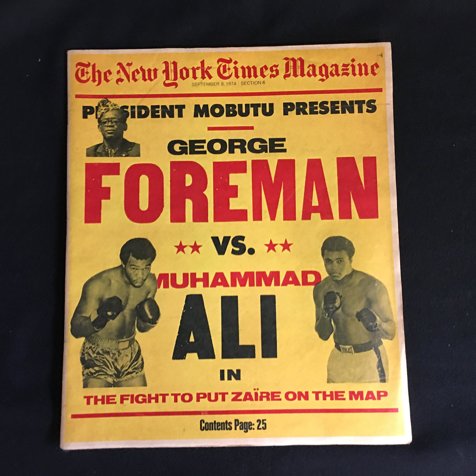 THE NEW YORK TIMES MAGAZINE "PRESIDENT MOBUTU PRESENTS": THE NEW YORK TIMES MAGAZINE "PRESIDENT MOBUTU PRESENTS" FOREMAN VS ALI COVER (1974)