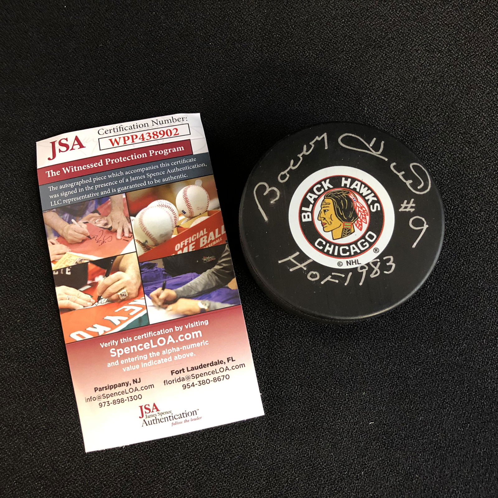 BOBBY HULL SIGNED BLACK HAWKS PUCK (JSA COA) (1 of 3)