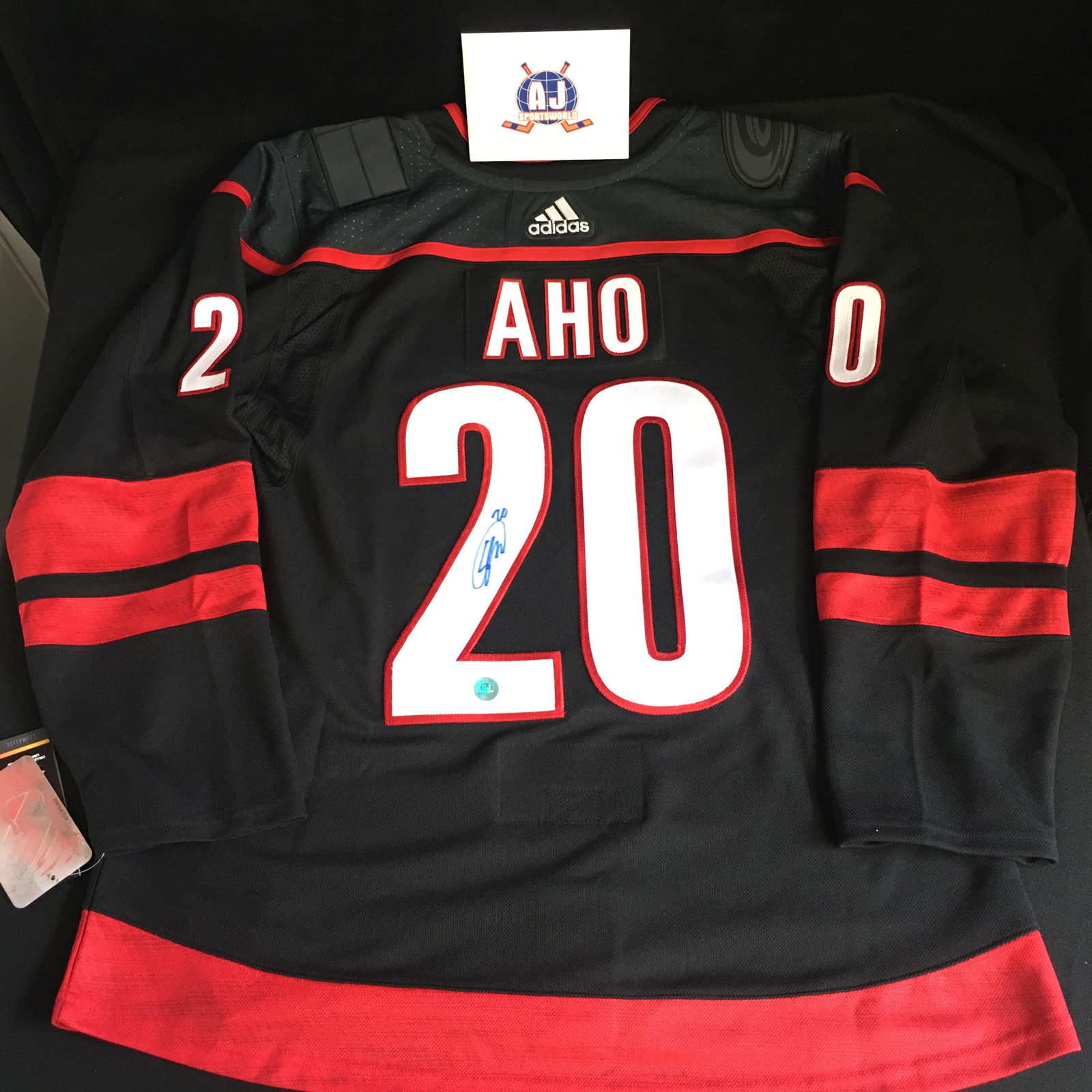 SABASTIAN AHO SIGNED OFFICIAL ADIDAS PRO CANES JERSEY (: SABASTIAN AHO SIGNED OFFICIAL ADIDAS PRO CANES JERSEY ( AJ COA)