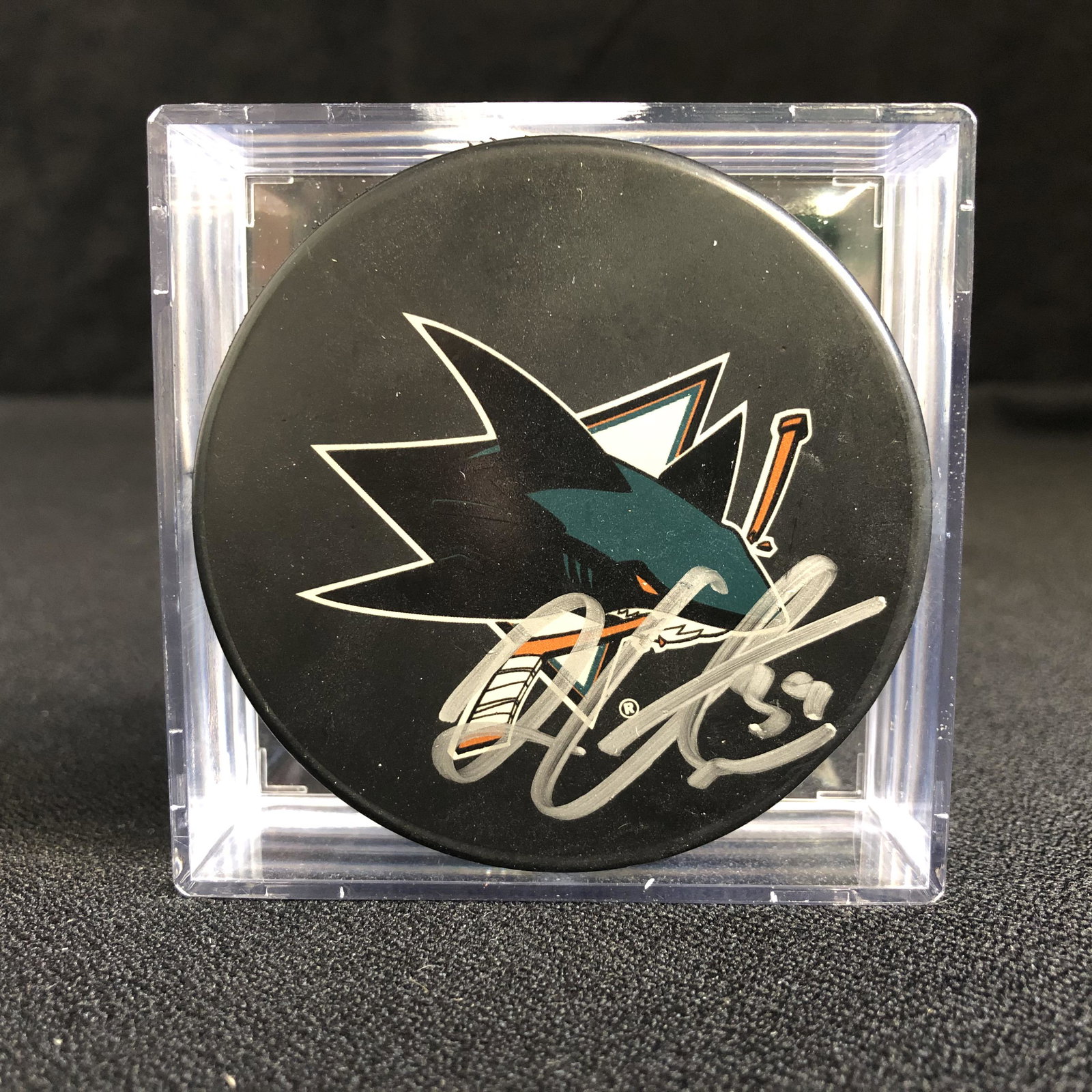 LOGAN COUTUTRE SIGNED SHARKS HOCKEY PUCK: LOGAN COUTUTRE SIGNED SHARKS HOCKEY PUCK