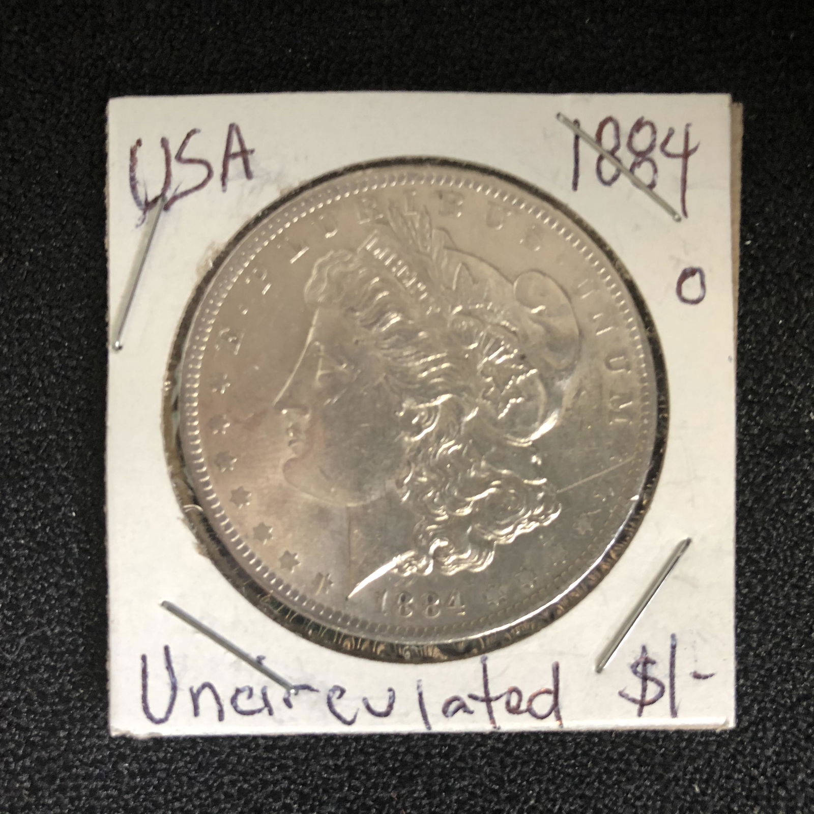 1884 USA MORGAN SILVER DOLLAR (NEW ORLEANS MINTED) (1 of 2)