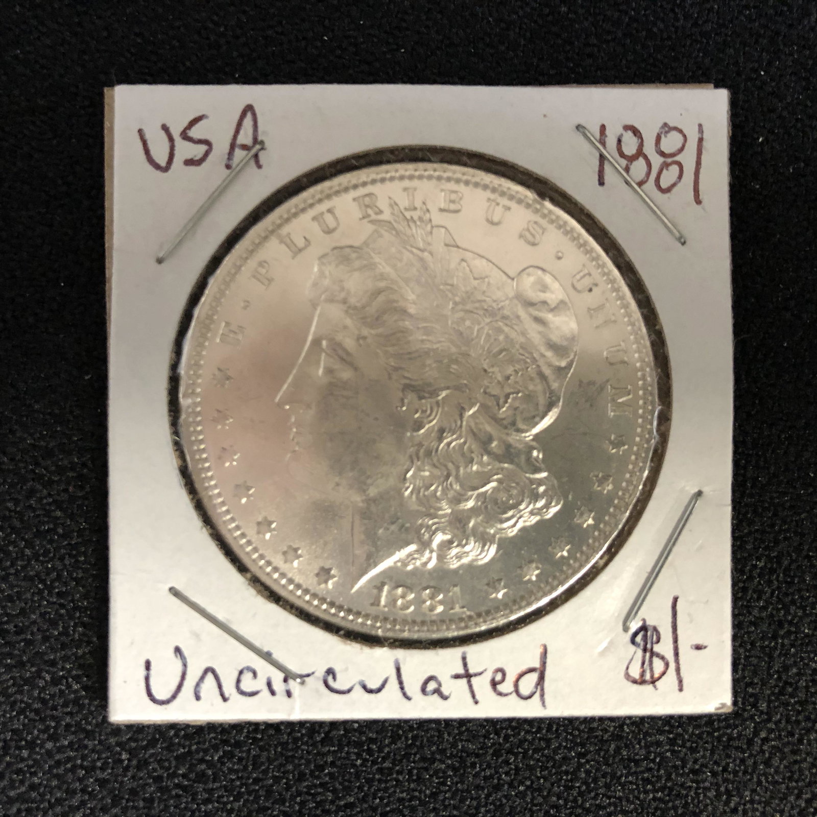 1881 USA MORGAN SILVER DOLLAR ( UNCIRCULATED) (1 of 2)
