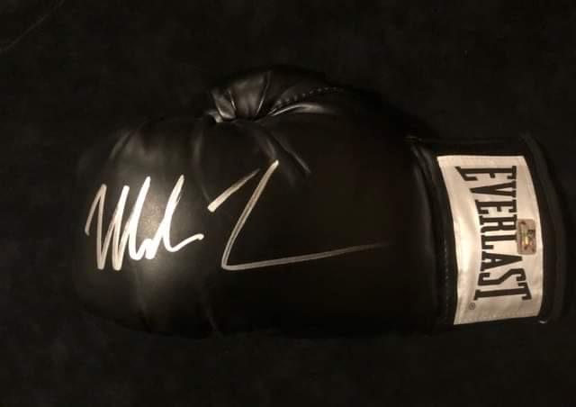 MIKE TYSON SIGNED BLACK EVERLAST BOXING GLOVE (FITERMAN: MIKE TYSON SIGNED BLACK EVERLAST BOXING GLOVE (FITERMAN HOLOGRAM)