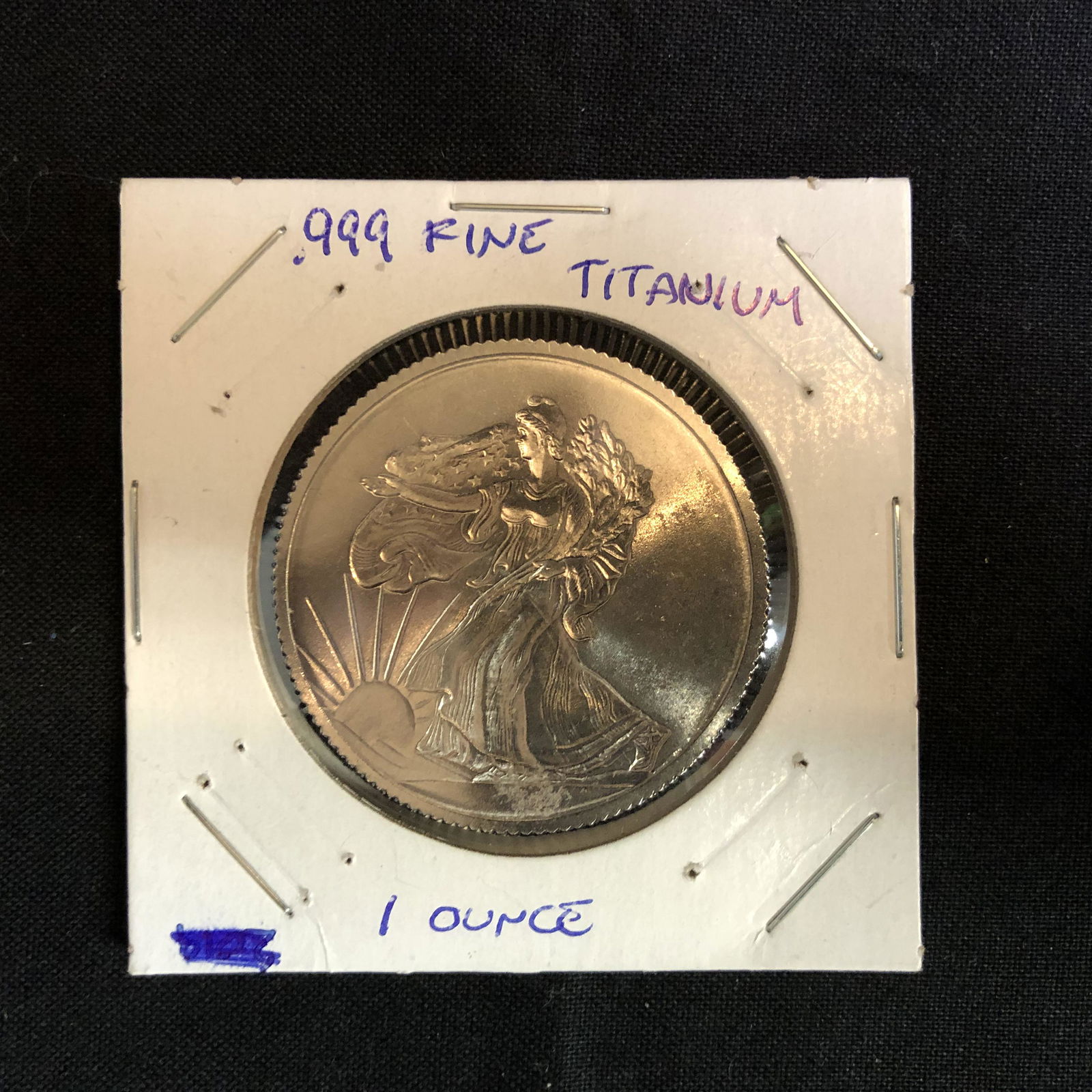 ONE OUNCE .999 FINE TITANIUM COIN: ONE OUNCE .999 FINE TITANIUM COIN