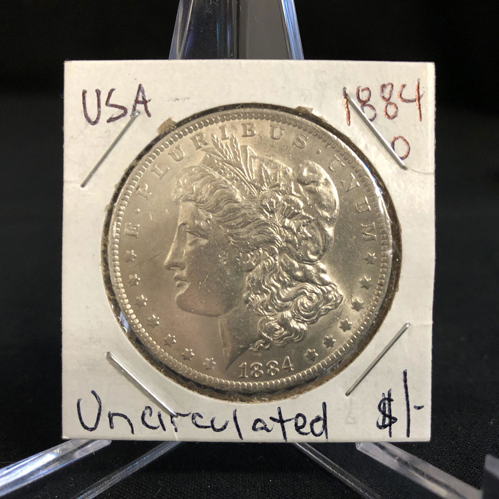 1884 USA MORGAN SILVER DOLLAR (NEW ORLEANS MINTED) (1 of 2)