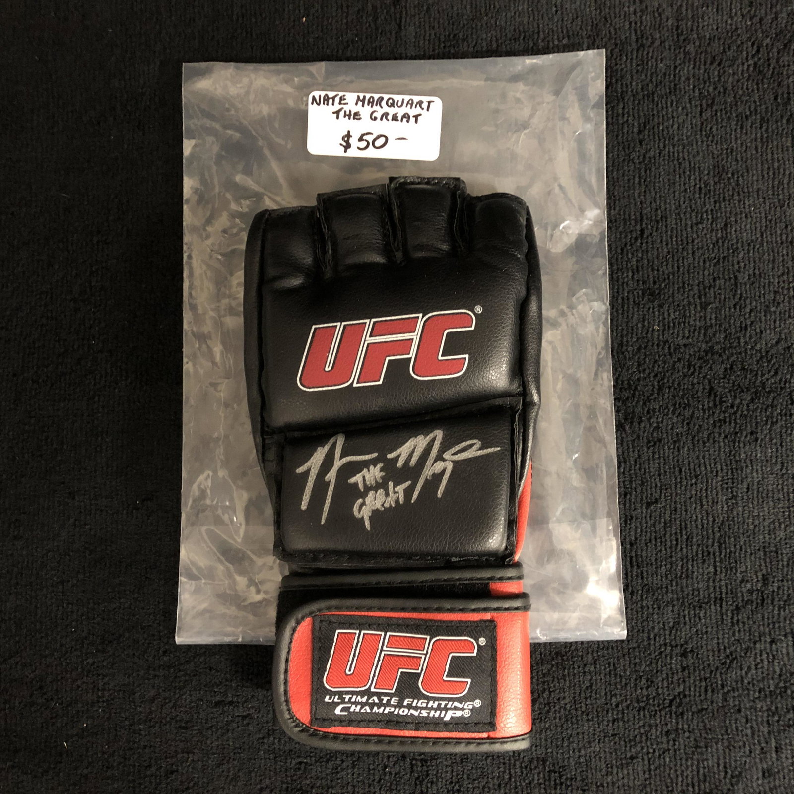 NATE "THE GREAT" MARQUART SIGNED UFC GLOVE: NATE "THE GREAT" MARQUART SIGNED UFC GLOVE