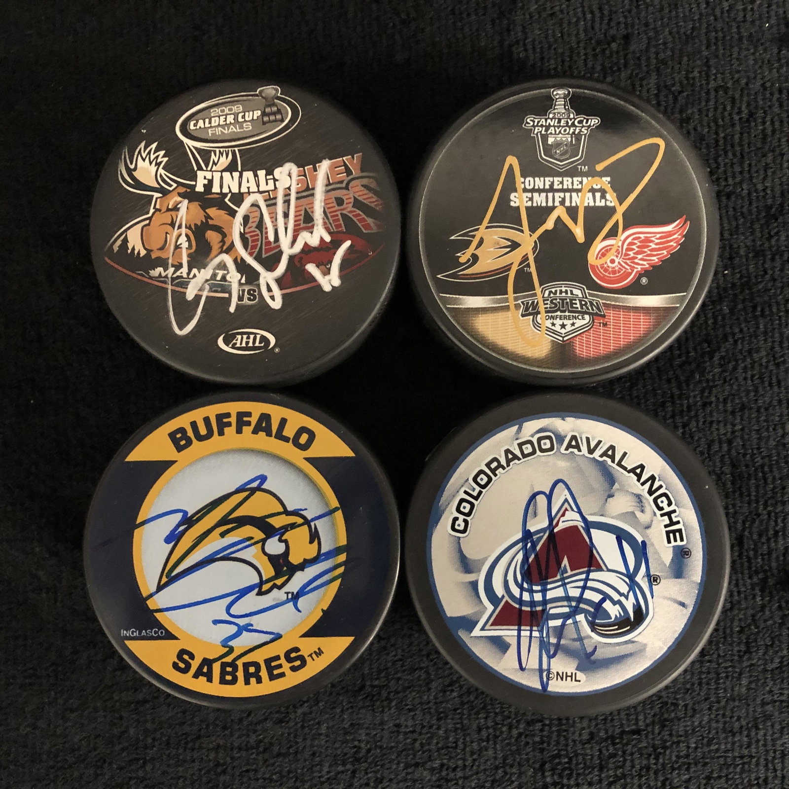 NHL AUTOGRAPHED PUCK LOT (SCHNEIDER, ABDELKADER, ELLIS (1 of 2)