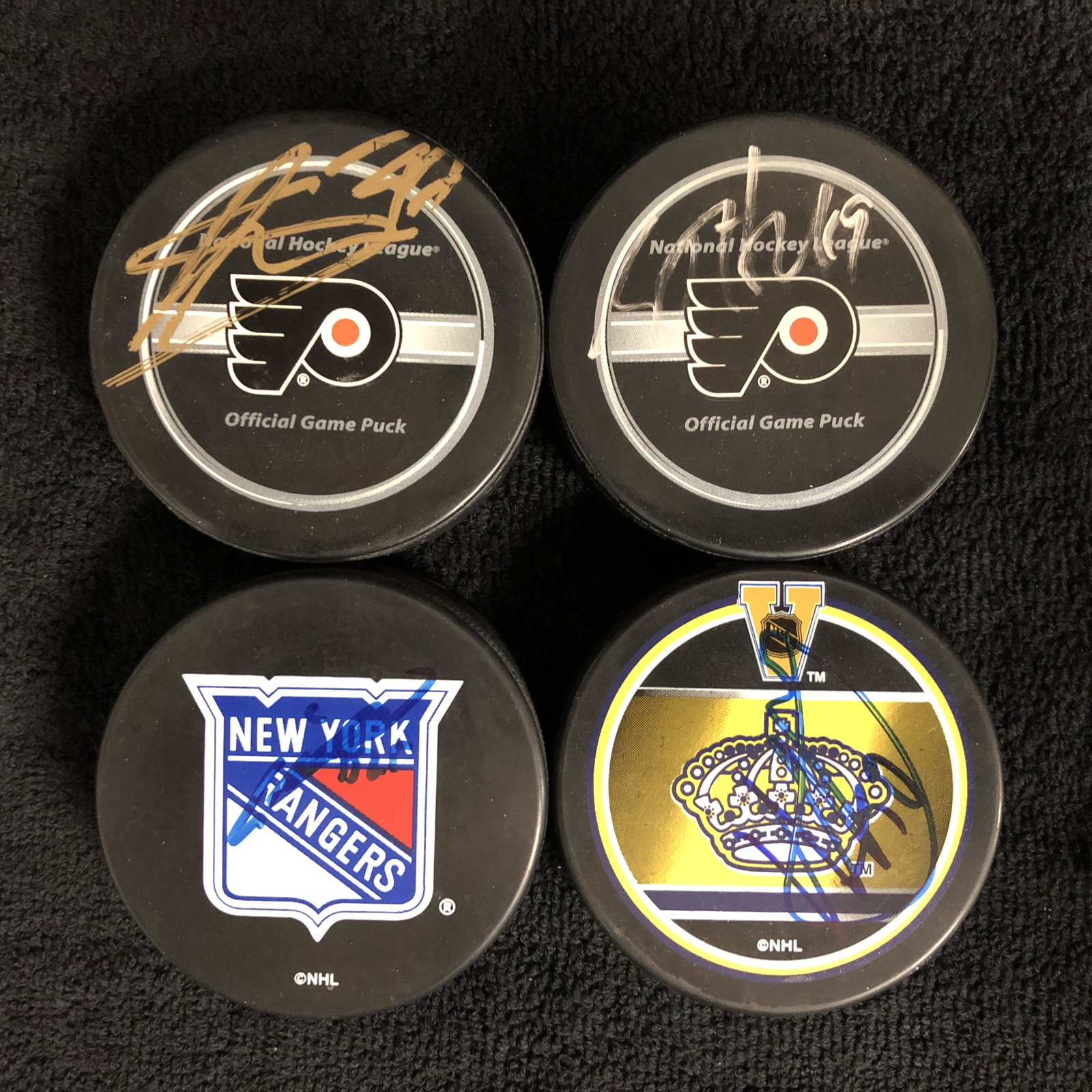 AUTOGRAPHED HOCKEY PUCK LOT (SBISA, HARTNELL,: AUTOGRAPHED HOCKEY PUCK LOT (SBISA, HARTNELL, KORPIKOSKI, GARON)