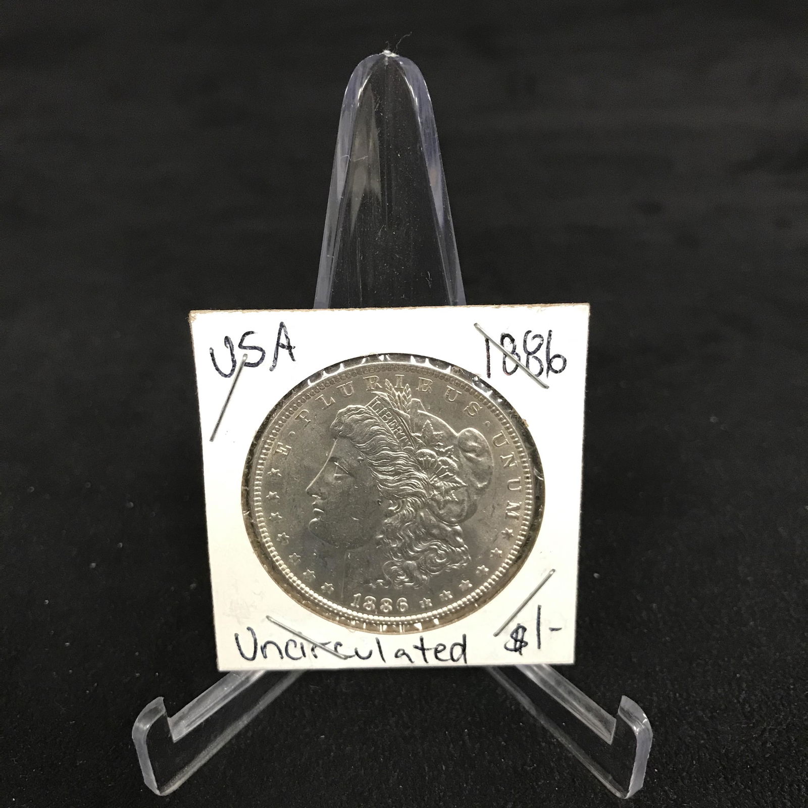 1886 USA MORGAN SILVER DOLLAR COIN (UNCIRCULATED) (1 of 1)