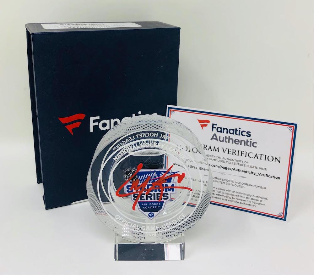 CALE MAKAR SIGNED '20 STADIUM SERIES ICE CRYSTAL PUCK: CALE MAKAR AUTOGRAPHED '20 STADIUM SERIES ICE CRYSTAL PUCK W/DISPLAY (FANATICS COA)