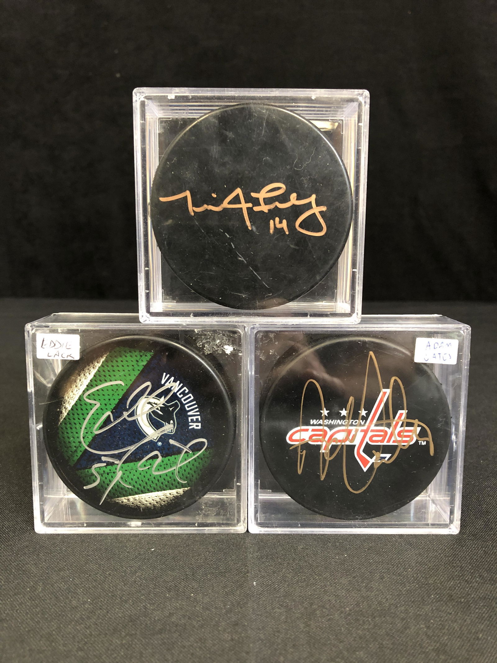 AUTOGRAPHED HOCKEY PUCK LOT (ADAM OATES, EDDIE LACK...) (1 of 1)