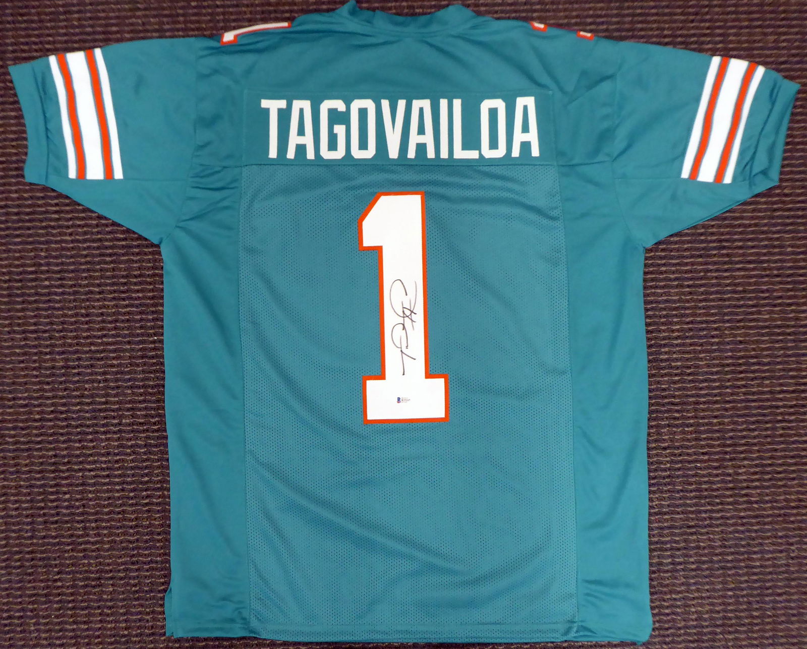 TUA TAGOVAILOA SIGNED MIAMI DOLPHINS JERSEY (BECKETT (1 of 4)
