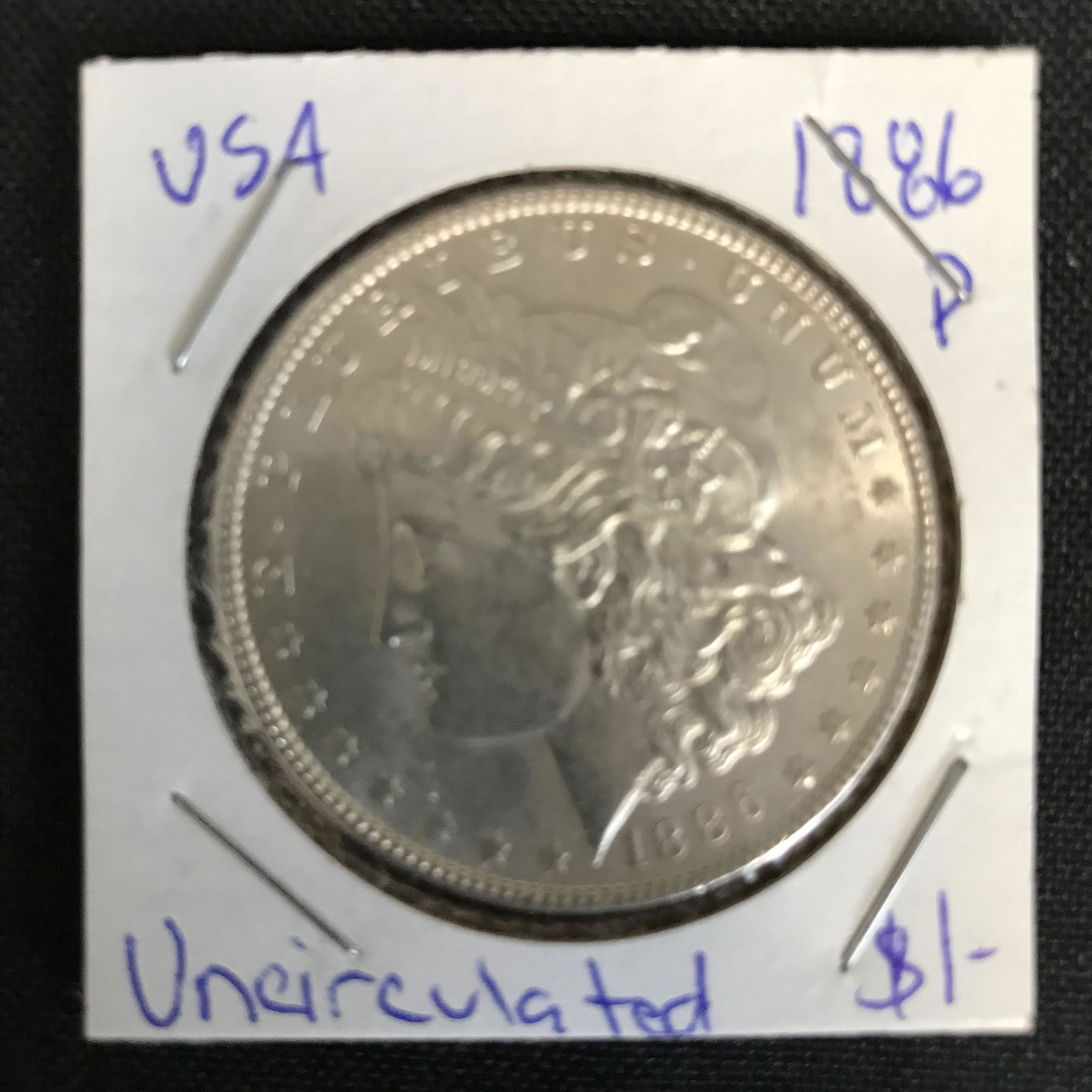 1886 USA MORGAN SILVER DOLLAR (UNCIRCULATED) (1 of 1)