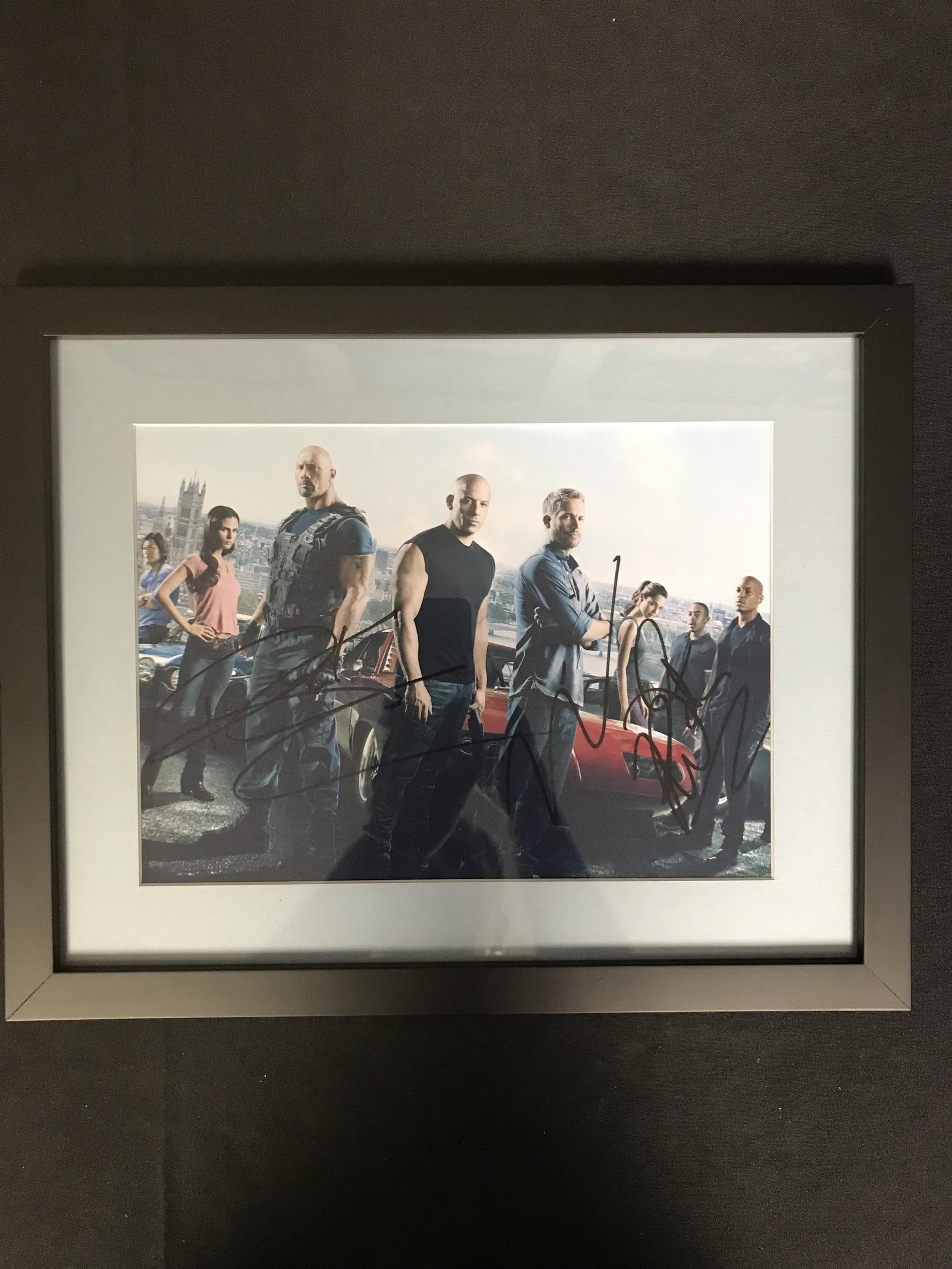 MULTI-SIGNED THE FAST AND THE FURIOUS 8X10 PHOTO (RA CO: 1MULTI-SIGNED THE FAST AND THE FURIOUS 8X10 PHOTO (RA COA)