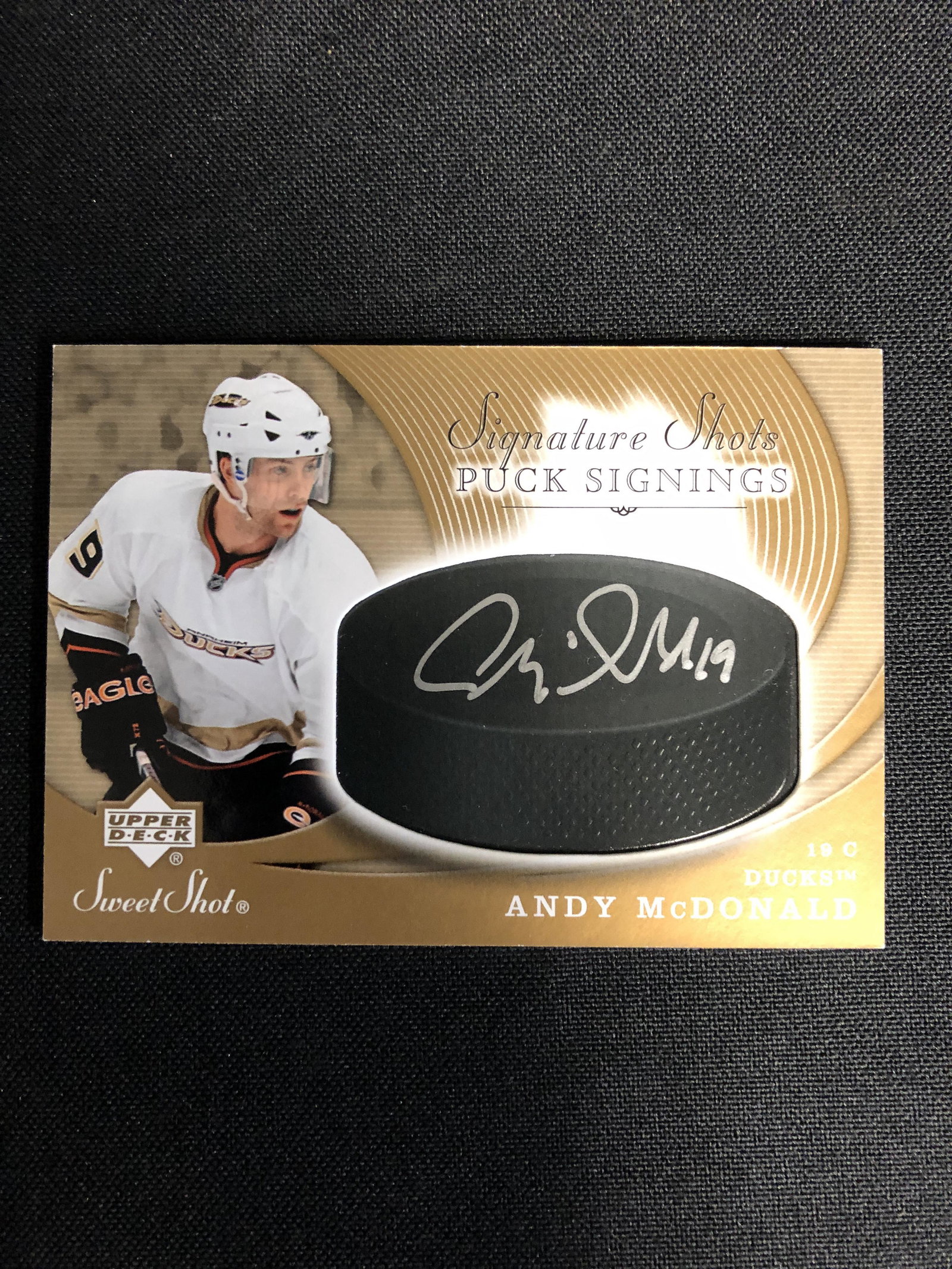 2007-08 UPPER DECK "SWEET SHOT" HOCKEY #SSP-AM ANDY: 2007-08 UPPER DECK "SWEET SHOT" HOCKEY #SSP-AM ANDY McDONALD SIGNATURE SHOTS PUCK SIGNINGS