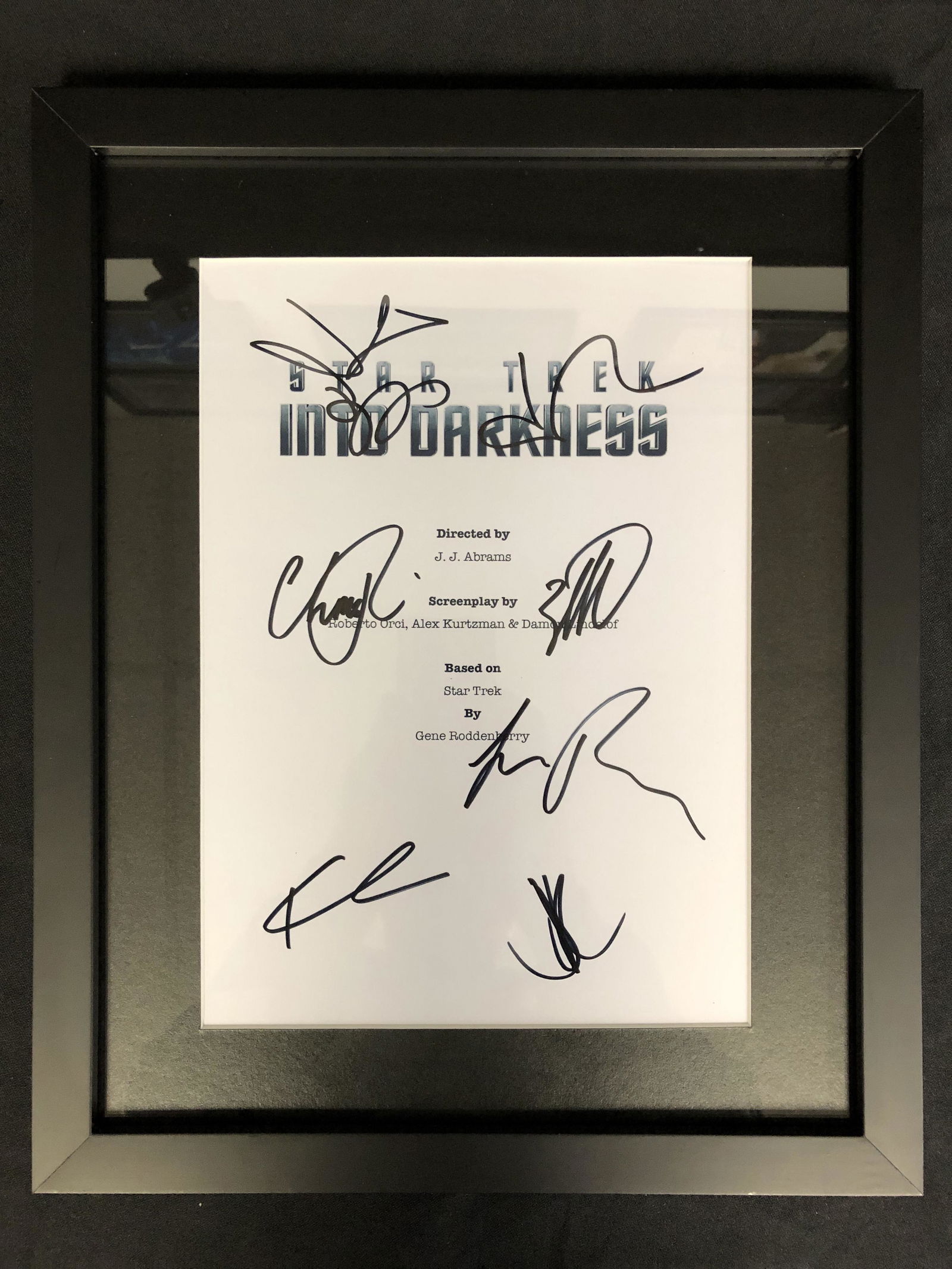STAR TREK INTO DARKNESS CAST SIGNED AND FRAMED SCRIPT (1 of 2)