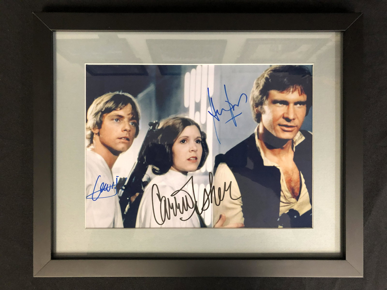CARRIE FISHER, HARRISON FORD AND MARK HAMILL SIGNED (1 of 3)