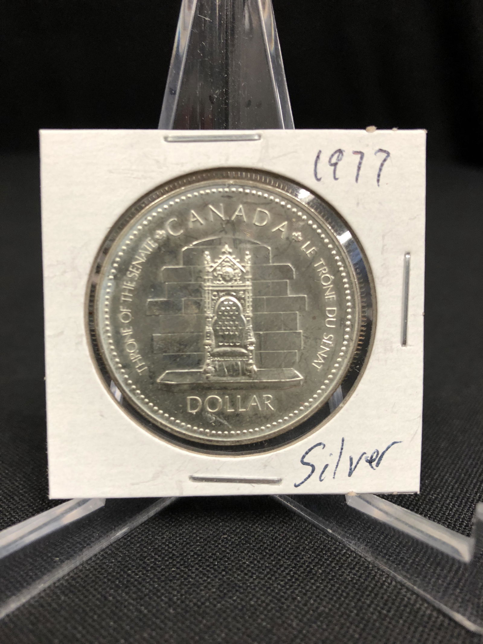 UNCIRCULATED 1977 CANADIAN SILVER DOLLAR {MADE OF (1 of 1)