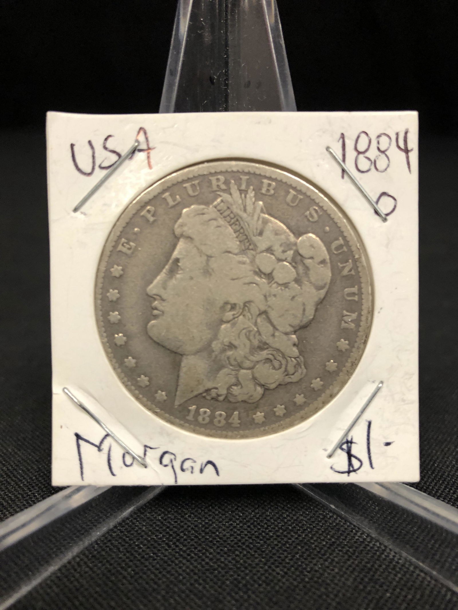1884 US MORGAN SILVER DOLLAR (NEW ORLEANS MINT) (1 of 1)