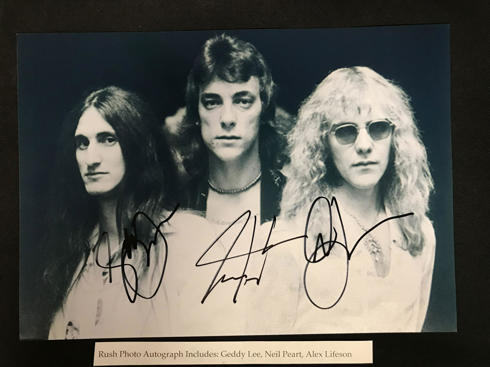 RUSH BAND SIGNED 8 X 10 (RA COA) (1 of 2)