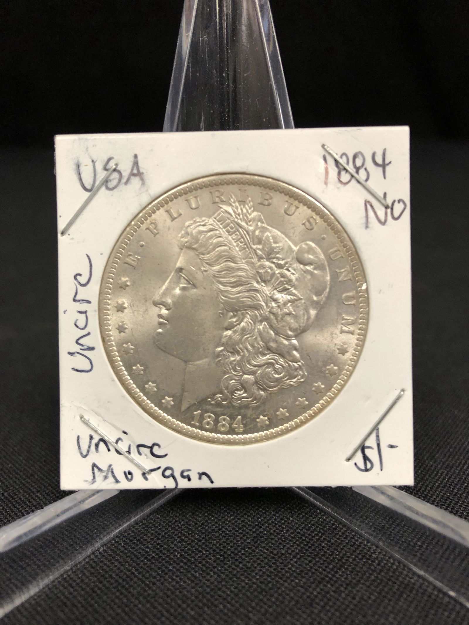 1884 US MORGAN SILVER DOLLAR UNCIRCULATED (1 of 1)